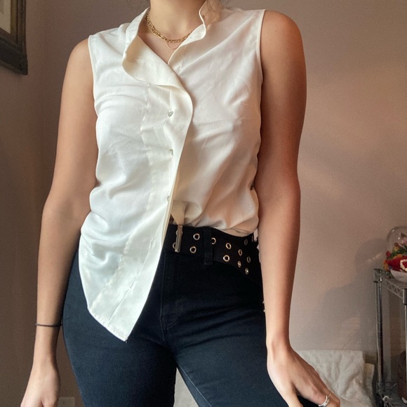 Cream sleeveless blouse size 4